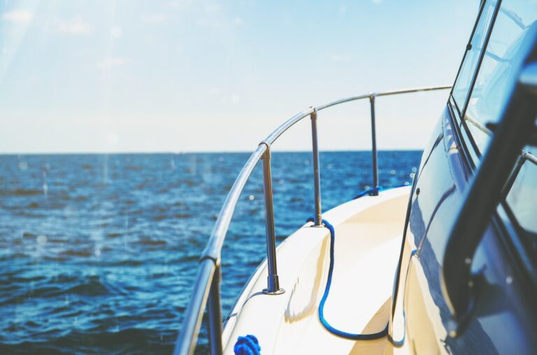 photo of white and gray ship in body of water